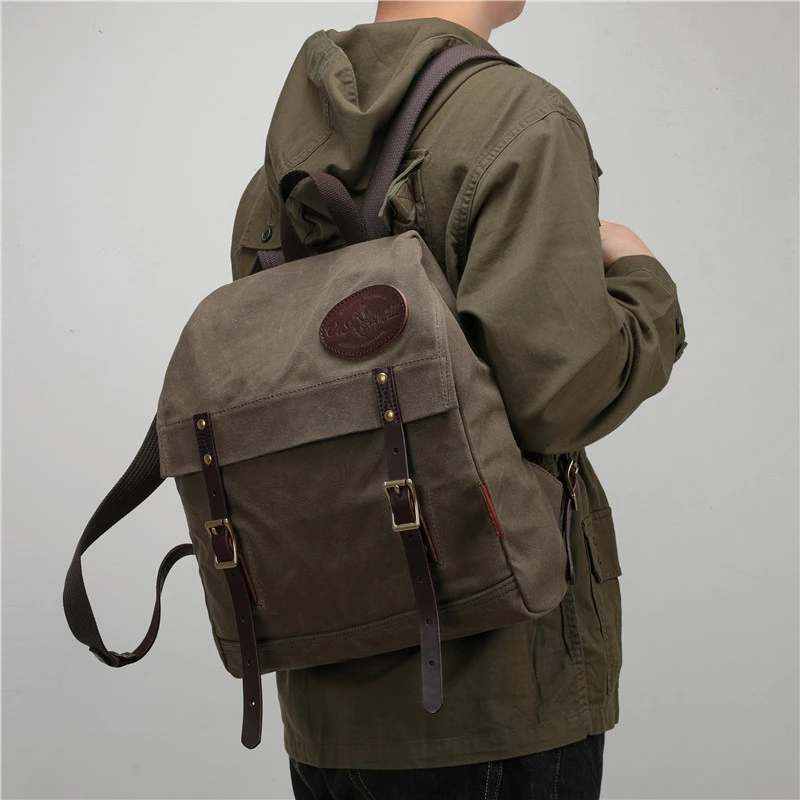 欧美男士复古油蜡帆布包大容量防水双肩包背包书包电脑包潮中性风
