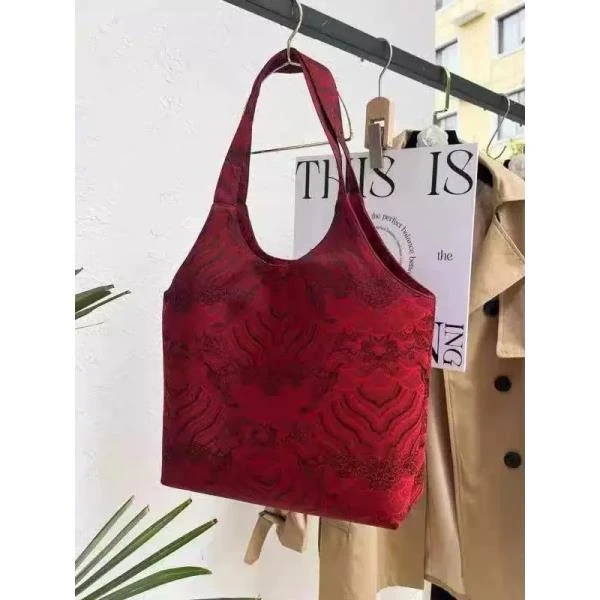 红色龙鳞纹国风系列特色手提加大元宝包