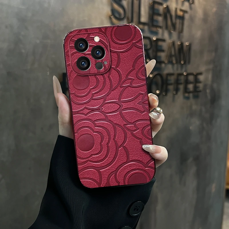 适用【苹果14pro】高级浮雕山茶花ins风秋冬皮质全包网红手机壳女款