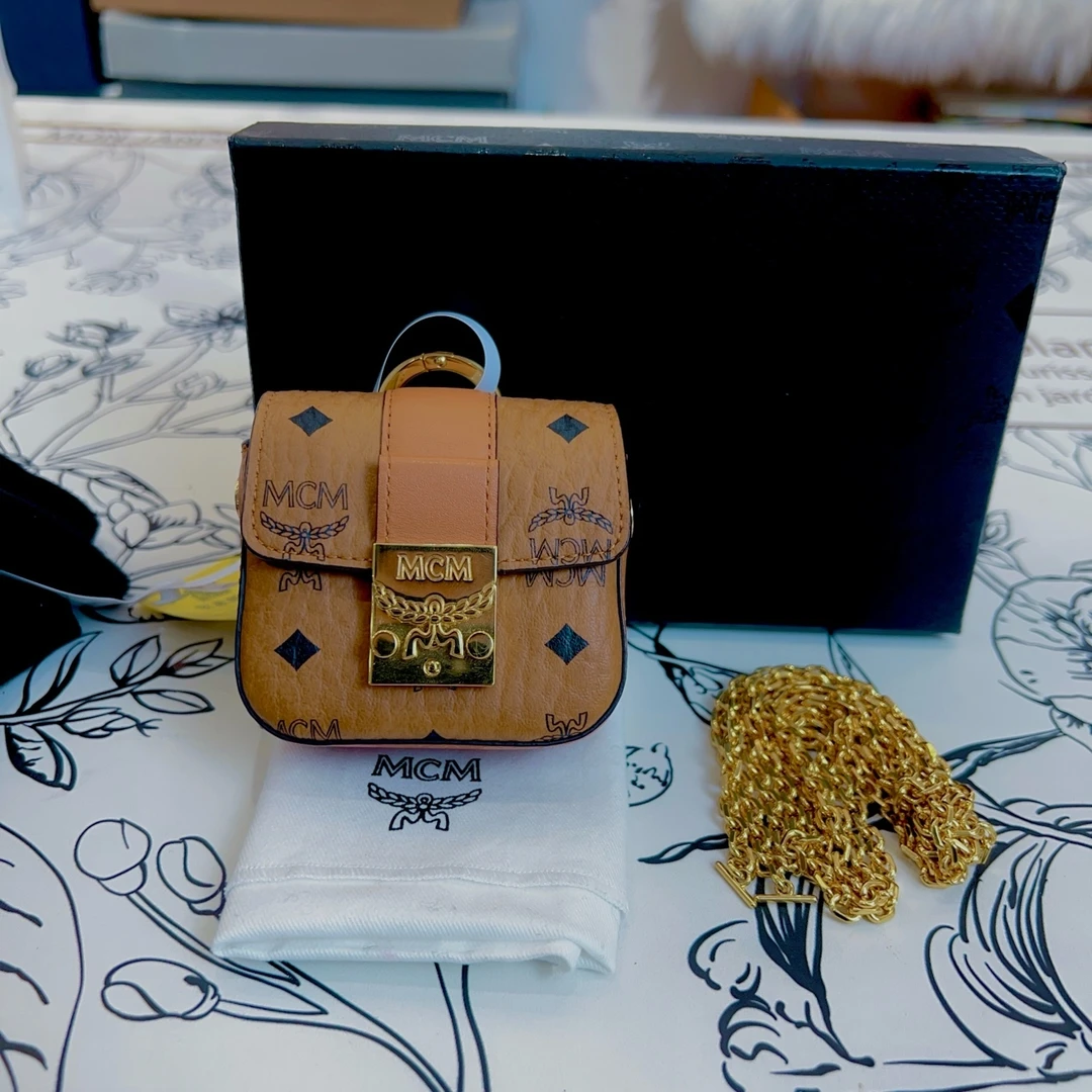 95新 MCM mcm干邑色耳机包a4289