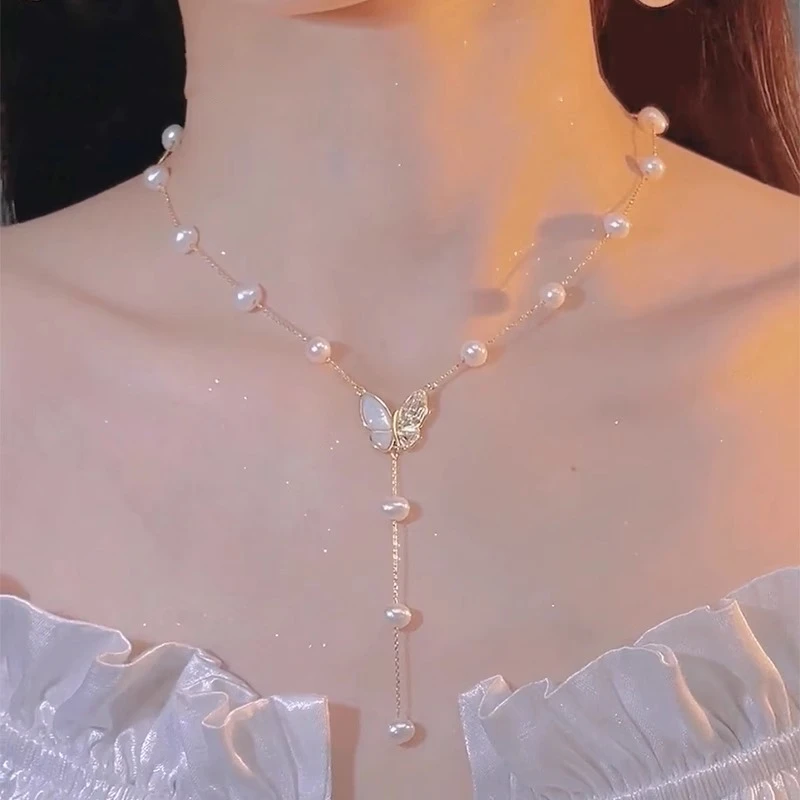 链子925银仿珍珠 夏季蝴蝶女小众设计高级流苏不对称贝壳吊坠颈链