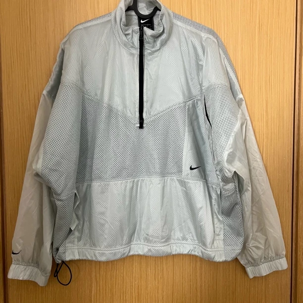 NIKE耐克成人半拉链宽松版速干上衣 女士