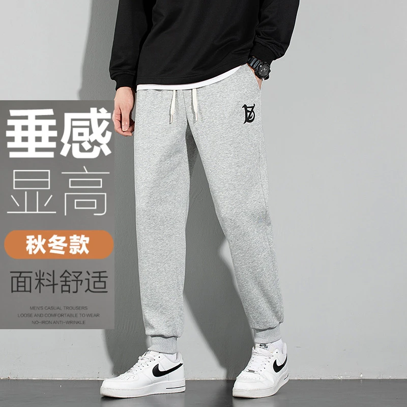 学生裤子男士2023春秋新款宽松束脚运动休闲卫裤男潮牌款大码长裤