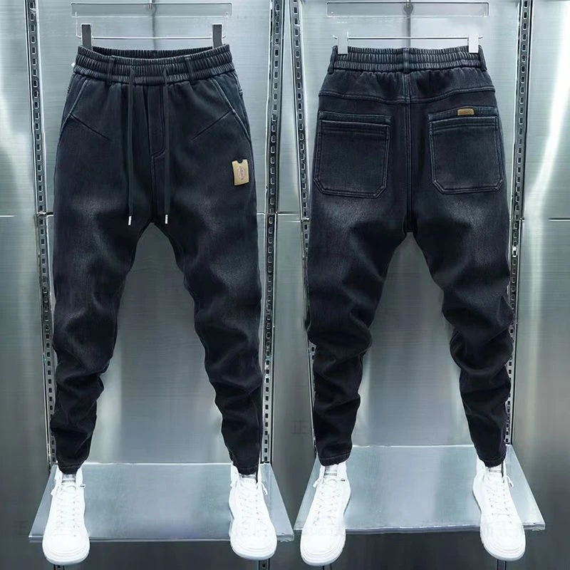 潮流秋季男士牛仔裤新款宽松黑色束脚修身纯色哈伦休闲裤松紧腰