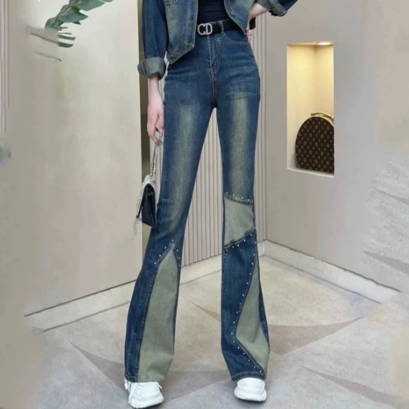 2025春秋新款港风复古做旧微喇叭铆钉拼接牛仔裤女高腰显瘦拖地裤