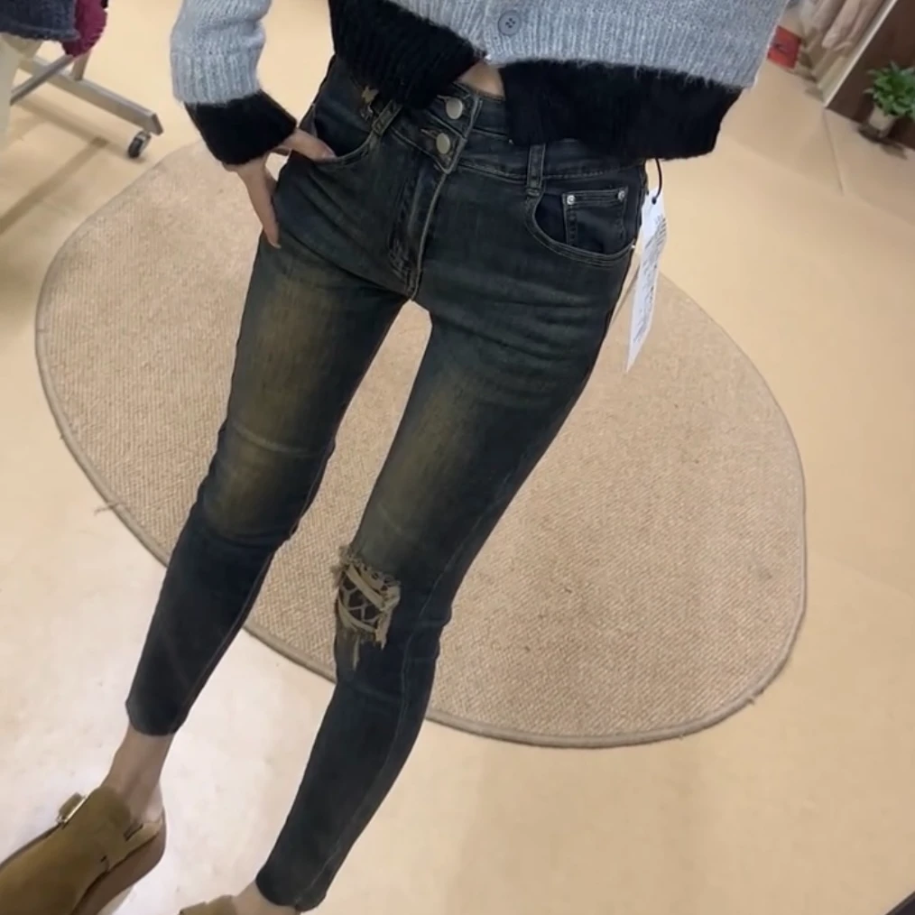 萱贝纯高腰显瘦破洞牛仔裤时尚豹纹小脚裤春秋新款九分弹力铅笔裤