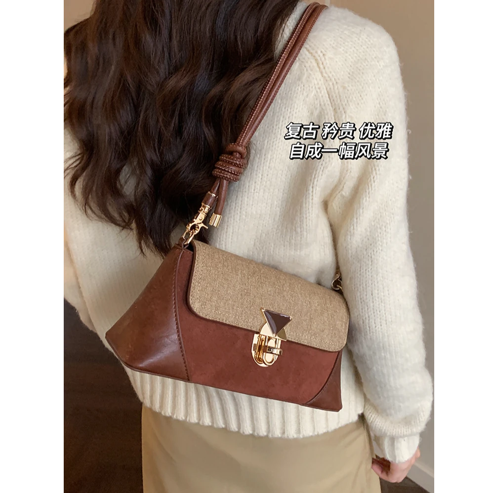 今年流行腋下法棍包包女式2025新款小众设计师单肩斜挎精致小方包