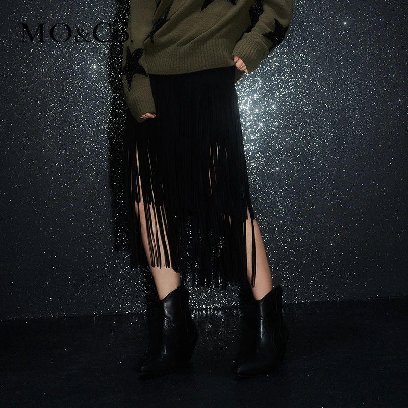 MOCO冬摇滚针织素皮双层流苏镂空高腰半身裙MBC4SKT021