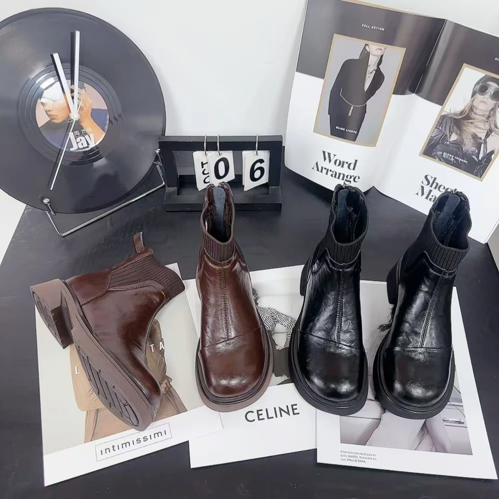 2570新款毛线口圆头舒适百搭软底矮跟时尚手抓纹马丁靴