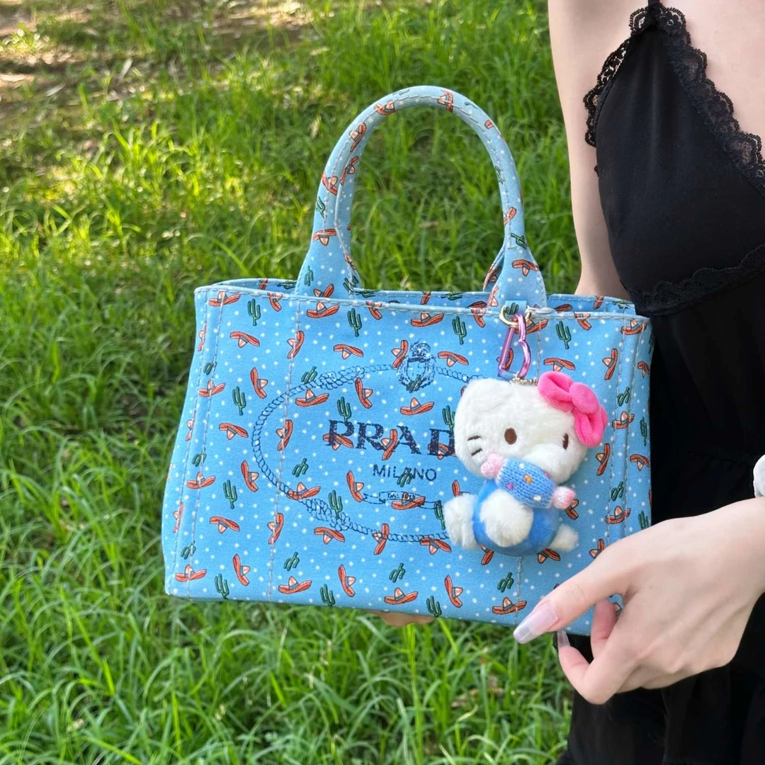 99新 Prada/普拉达  Prada 珍甄 沙滩手提斜挎包 14011