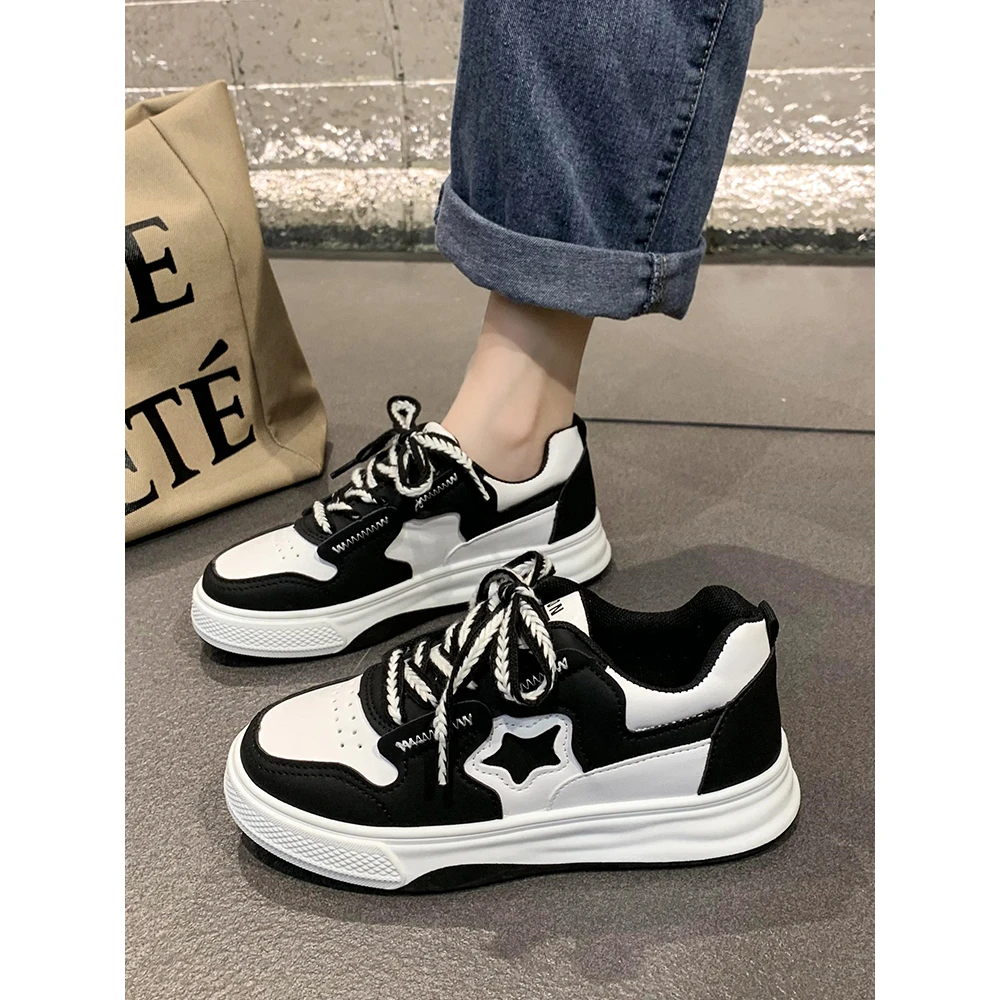 安踏神行板鞋女款秋季2023新款黑白熊猫女鞋初中学生运动鞋厚底小