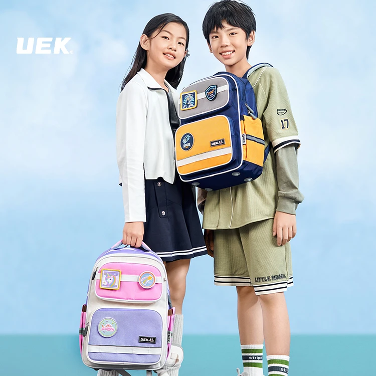 UEK玩趣徽章护脊书包大号小学生四到六年级时尚护脊减负双肩包