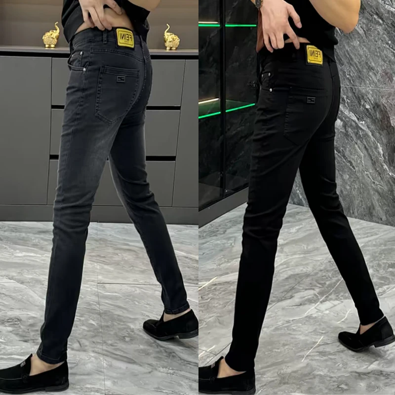 黑色水洗牛仔裤男春季欧货简约净版弹力修身小脚裤轻奢帅气直筒裤