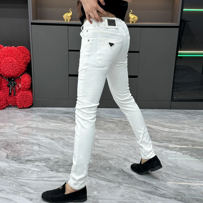 春秋新款白色牛仔裤男欧洲站潮牌简约水洗修身小脚裤时尚轻奢长裤