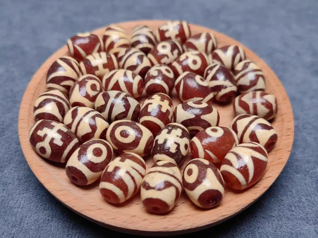 红肉牙黄小鼓珠16×12mm（此链接为2粒价格）。