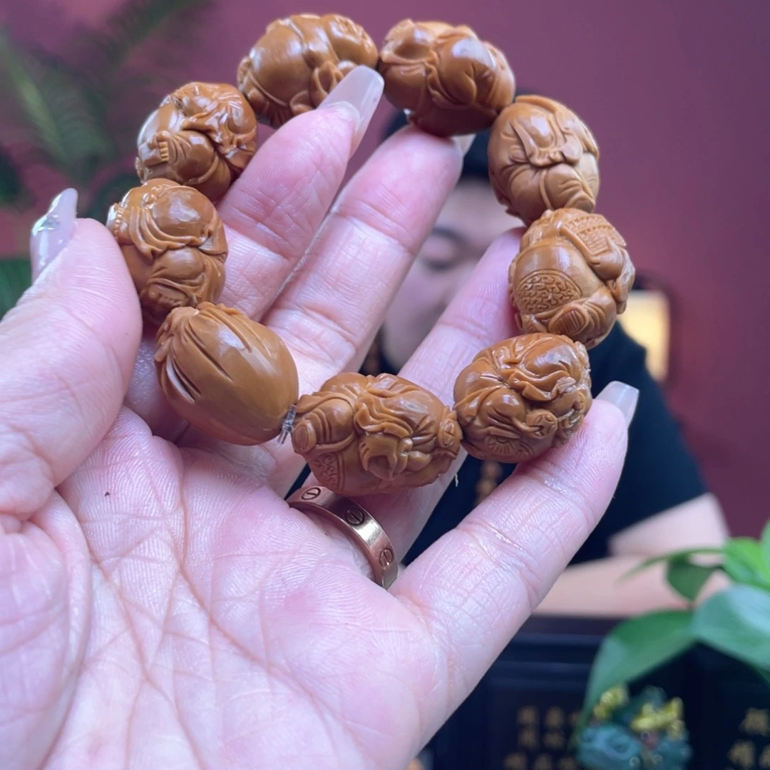 橄榄核手串阿***力橄榄核