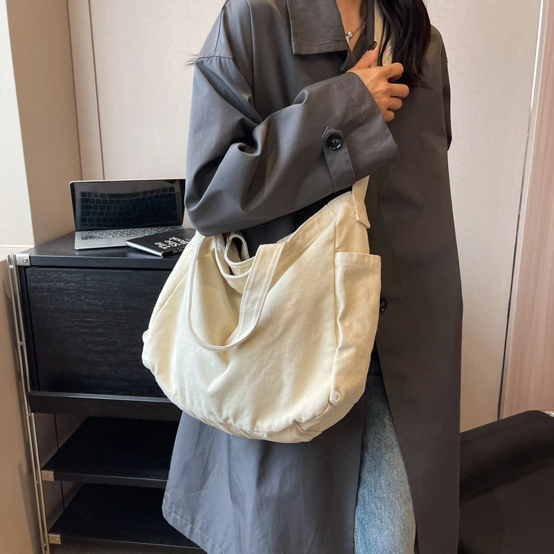 邮差包水洗帆布斜挎包男日系潮牌大容量单肩包休闲纯色学生时尚女
