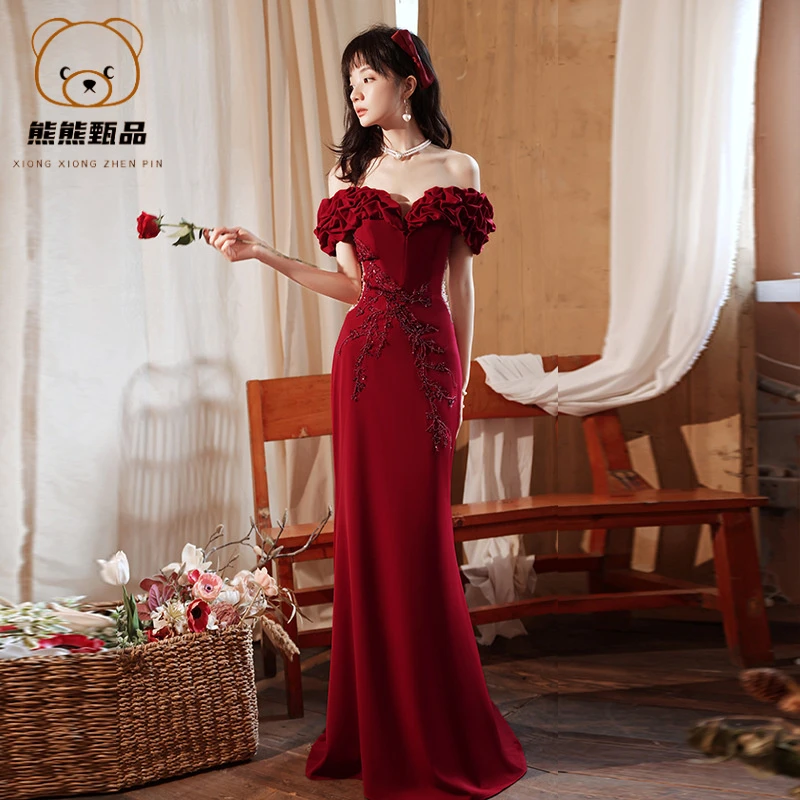 轻奢酒红色敬酒服2025新款一字肩鱼尾裙风范大气新娘结婚晚礼服yd