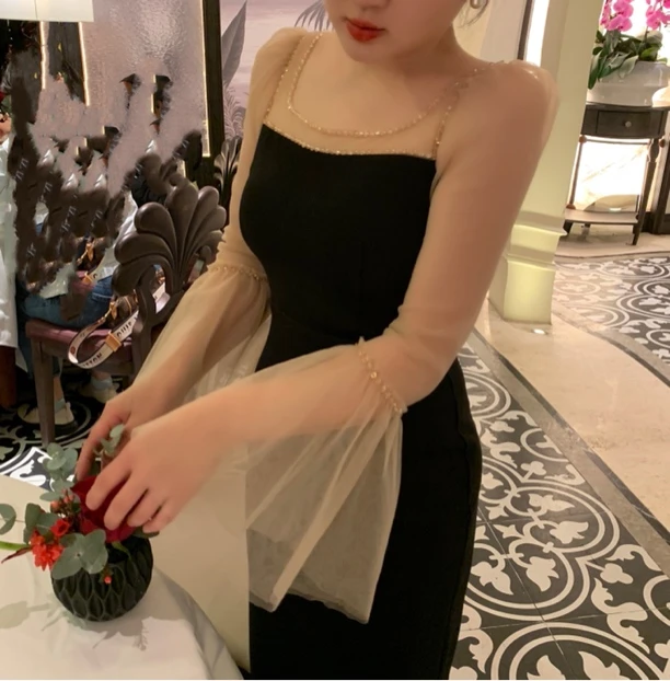 魅鹊 20105 【翩翩起舞】泰版时尚小众喇叭袖显瘦方领收腰小黑裙