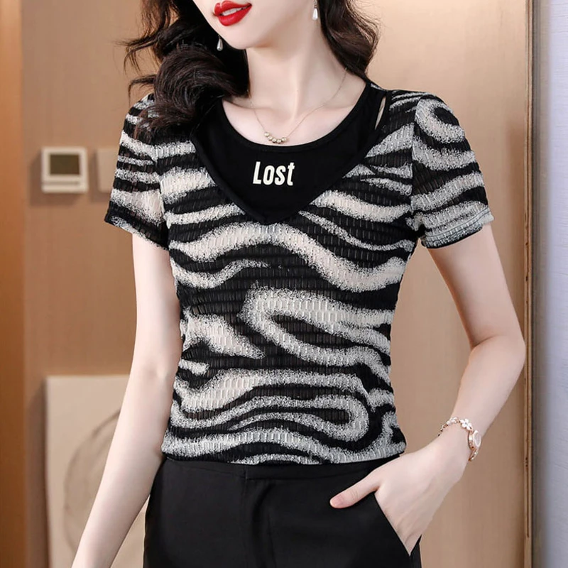 夏季新款圆领短袖女上衣斑马纹镂空T恤洋气宽松别致显瘦时髦ins