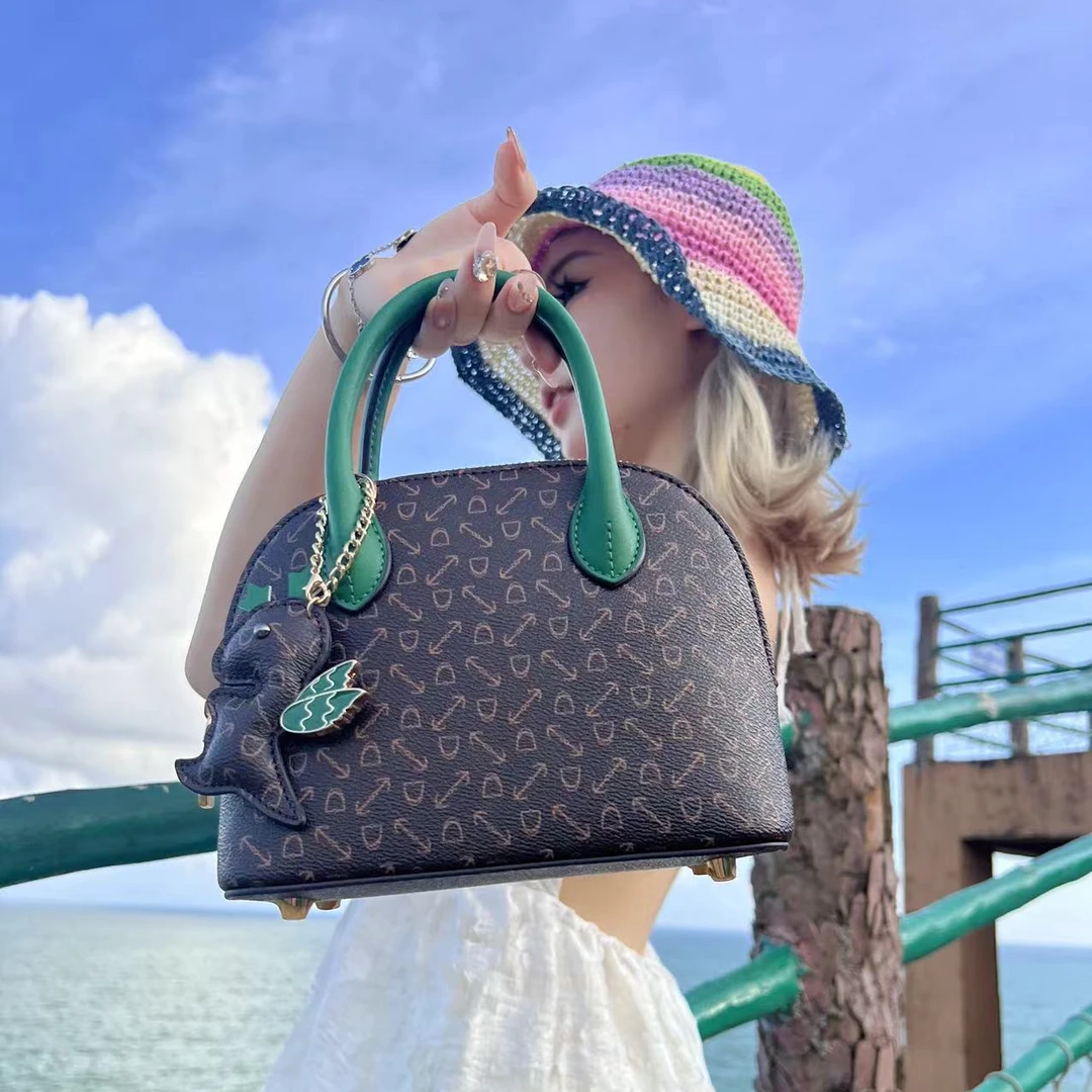 【URICK】2025春夏薄荷绿手提斜挎贝壳包双拼色A91778-1气质百搭