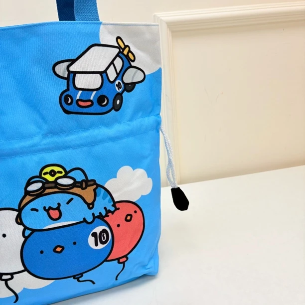 56621 卡通抽绳印花帆布单肩包，尺寸：40x30x10cm