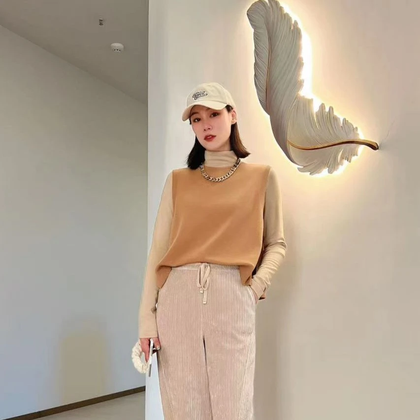 哥弟GIRDEAR新款秋冬时尚后开叉造型针织马夹1399701