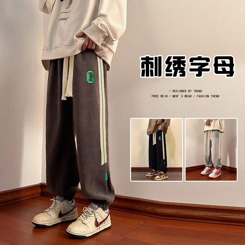 刺绣字母~侧边条纹~束脚时尚卫裤