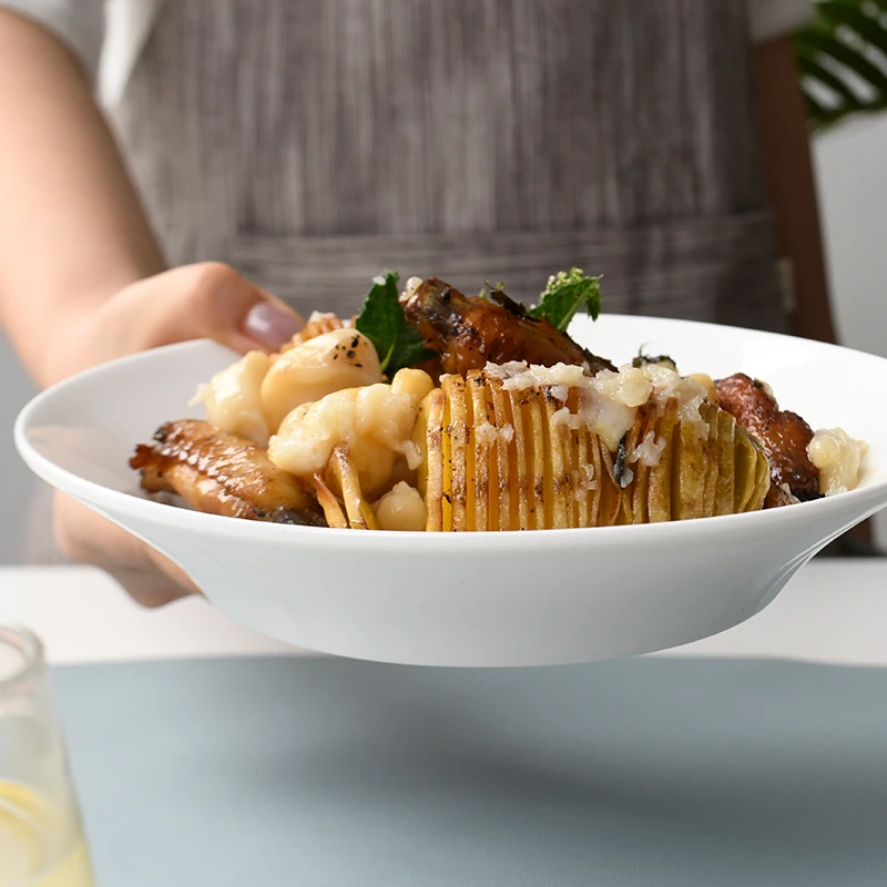 纯白的陶瓷盘高档菜盘网红个性餐具水果盘子家用微波炉烤箱专用盘