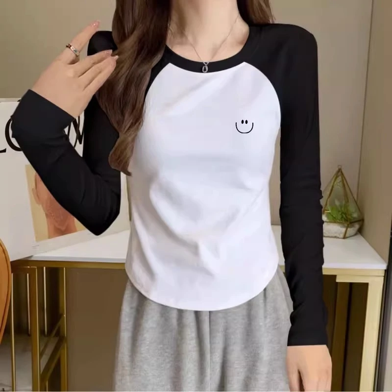 黑白插肩长袖t恤2023秋冬新款洋气短款弧形下摆设计感棉打底衫