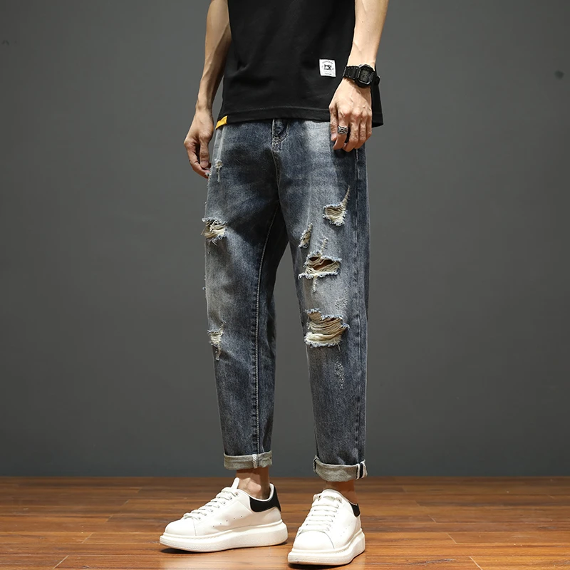 男款潮牌破洞牛仔裤男夏季男装新款休闲裤子男士薄款长裤哈伦男裤