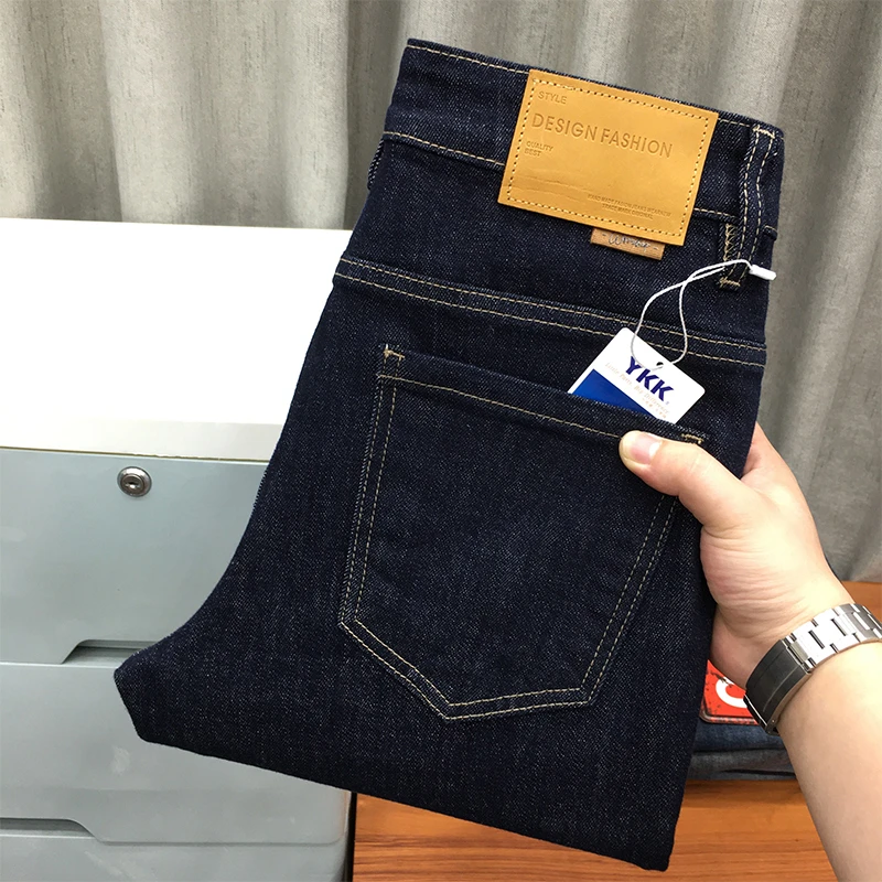 纯色高弹力牛仔裤男秋冬款休闲百搭青年深蓝色修身小脚长裤子秋季