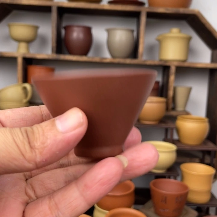 紫砂茶杯87655543356787776