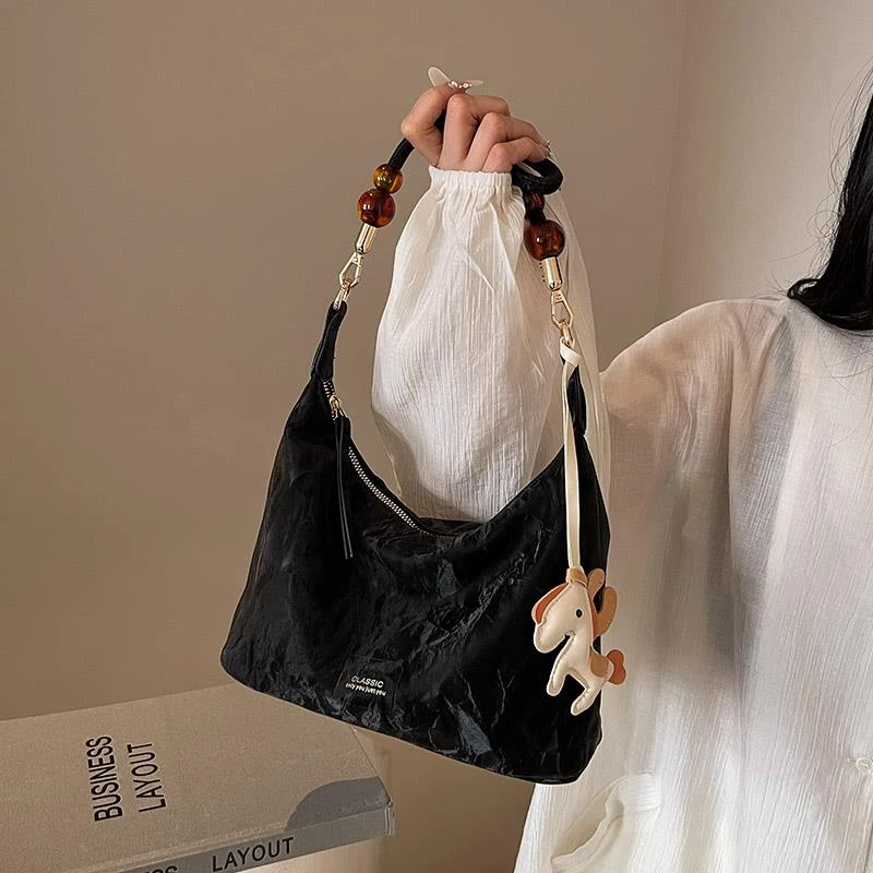 休闲软面小众设计包包女士2025新款流行百搭斜挎包超火单肩腋下包