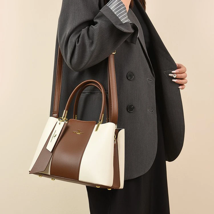 袋鼠手提包女2023新款大气中年时尚妈妈包真皮通勒撞色简约斜挎包