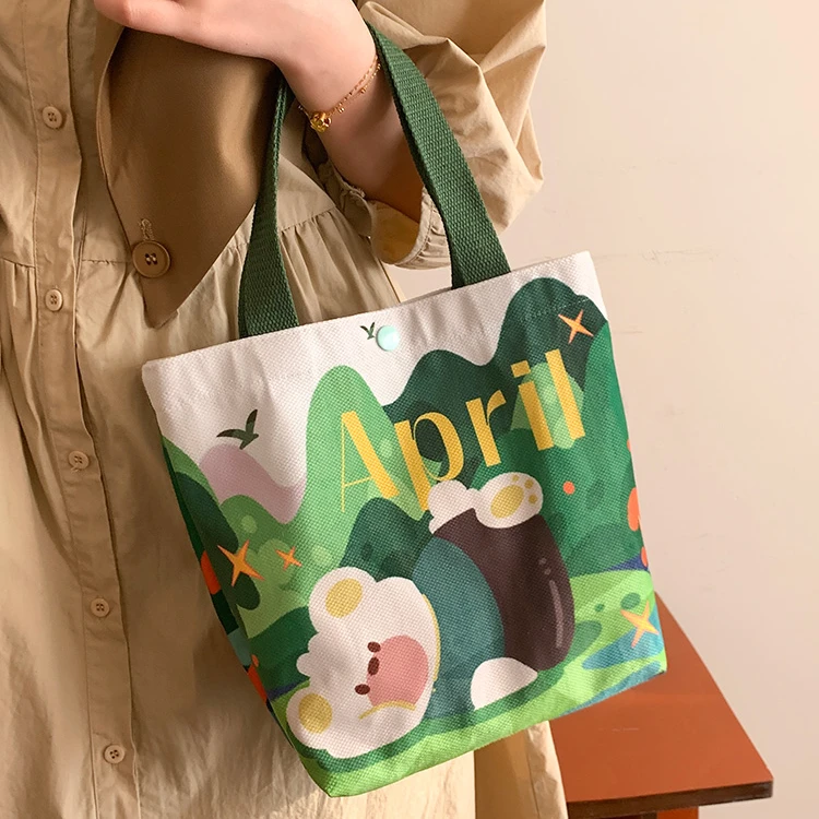 手提袋子时尚外出帆布包女2025新款便当包小零食袋饭盒通勤手拎包