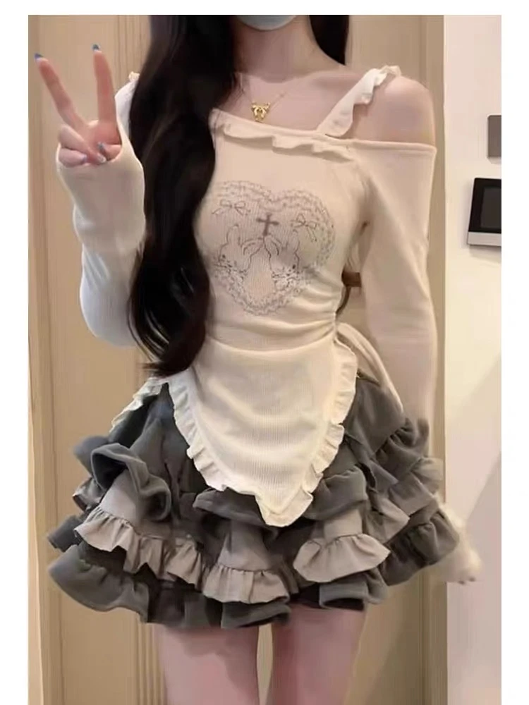 9867 大码女装秋季甜酷辣妹风印花T恤+不规则下摆半身裙两件套