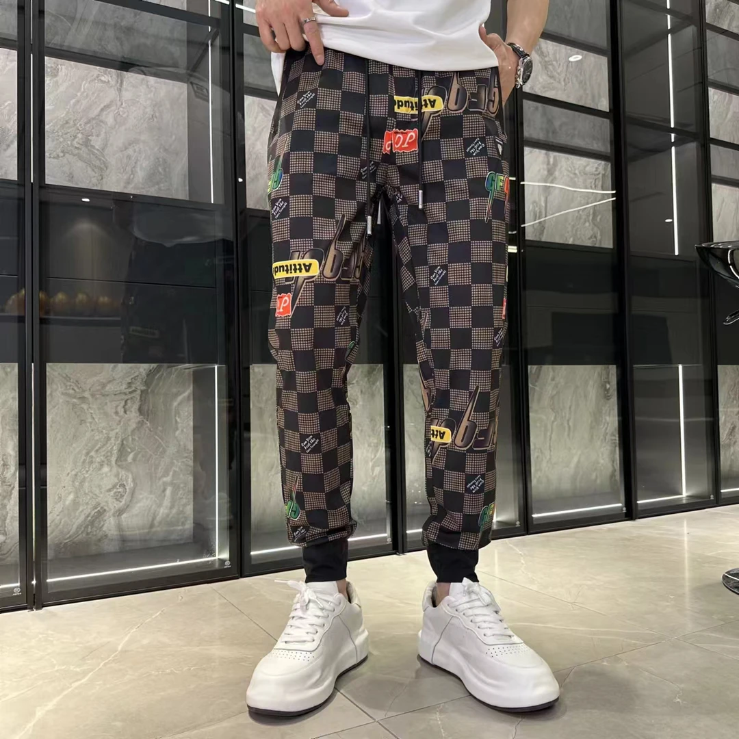 2024男休闲裤夏季冰丝面料印花潮流松紧腰束脚裤撞色搭配7712