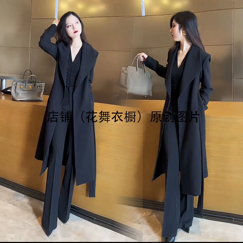 潮2024秋年季新款高端气质时尚收腰系带风衣外套微喇叭裤两件套装