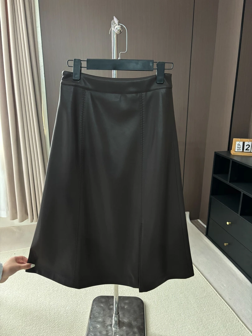 海宁2024新款正品皮裙女A字半身裙伞裙百搭显瘦拱针裙气质中长裙