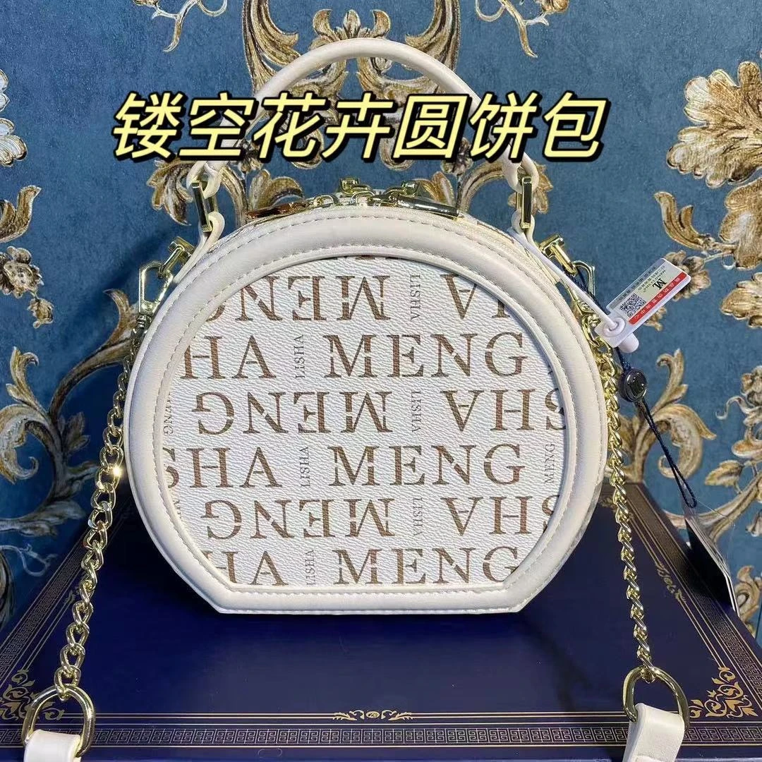 梦丽莎新款镂空花卉圆饼包今年流行款时尚新品女包