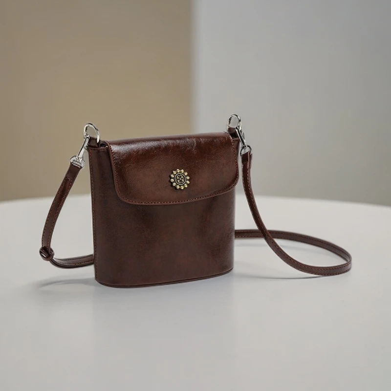 2024欧尼薇新款休闲太阳花水桶包便携百搭女士斜挎包包夏天单肩包