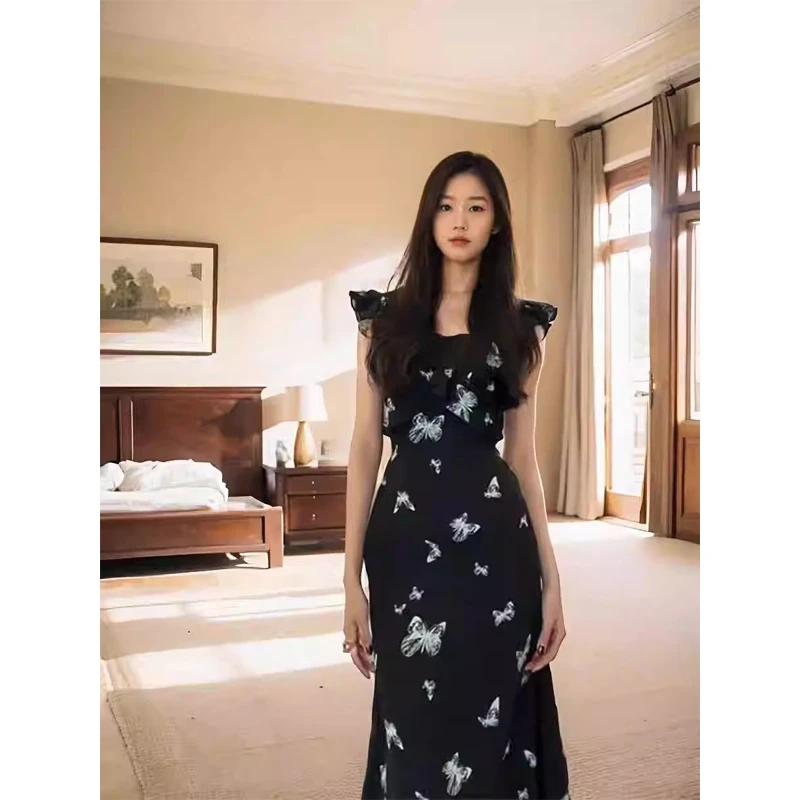 夏季2025新款裙子飞飞袖蝴蝶印花鱼尾中长裙黑色收腰无袖连衣裙女