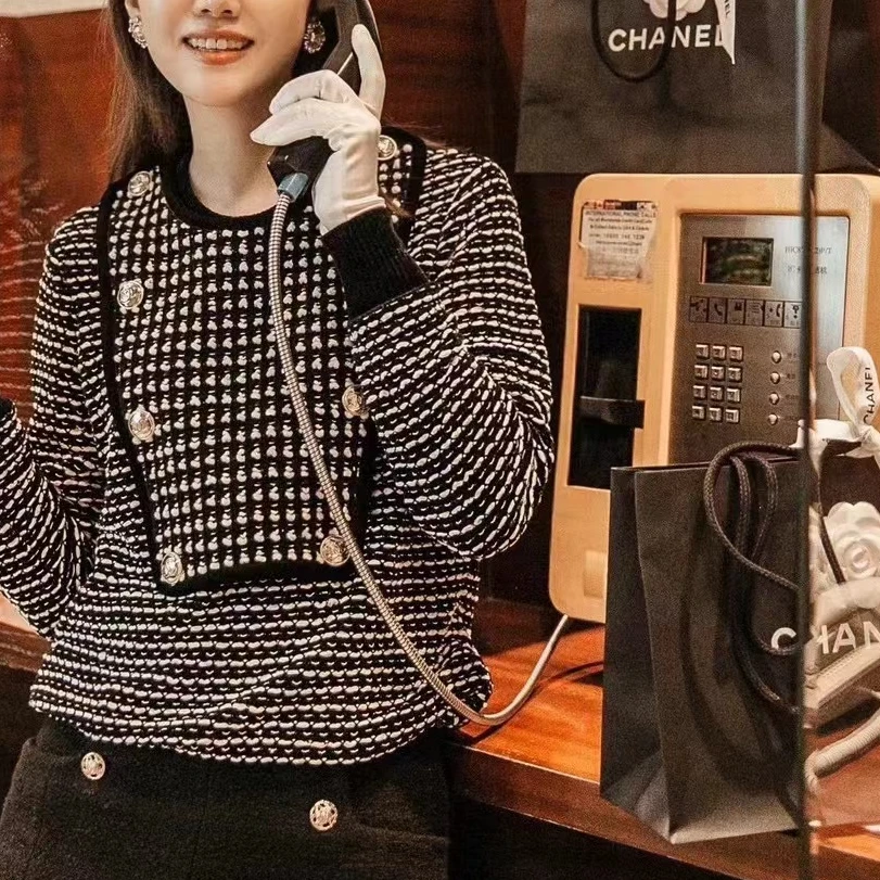 99新 Chanel/香奈儿 36码 20K秋冬黑白金色双排扣毛衣
