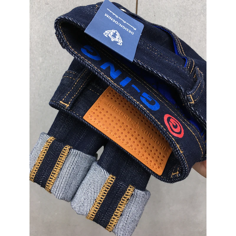 刺绣秋季牛仔长裤男2023新款高端潮流蓝色弹力休闲修身小脚九分裤