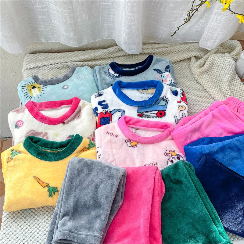 23款儿童法兰绒家居服套装男童女童加厚保暖宽松毛绒卡通套头加绒