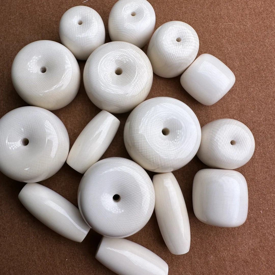 猛犸牙冰料原色满纹平面素墩子单珠、长桶珠