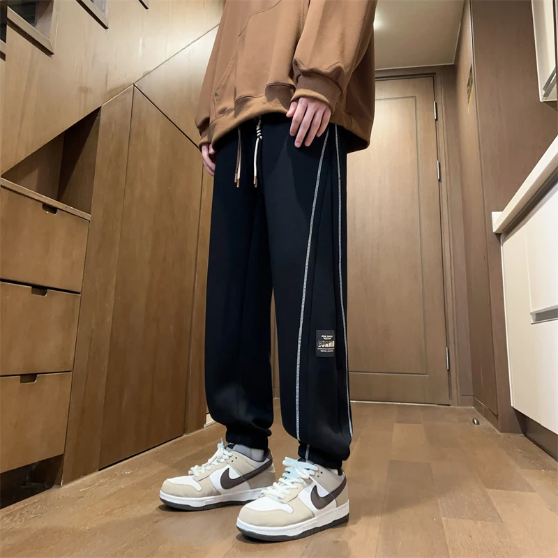 青少年春秋休闲潮流束脚休闲裤宽松运动裤学生时尚卫裤帅气裤子男