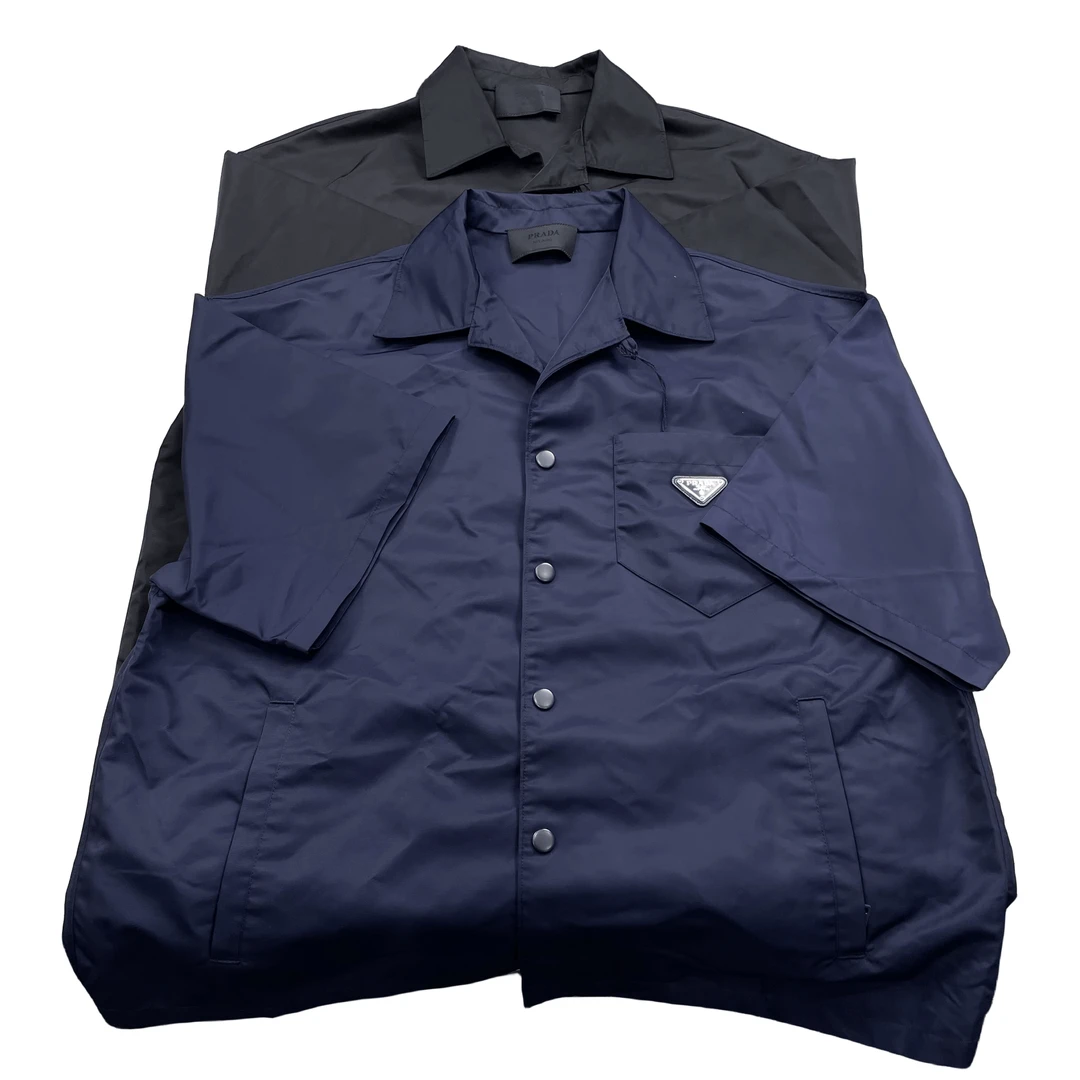 99新 Prada/普拉达 男士休闲短袖衬衫翻领口袋款 两色可选 SC449