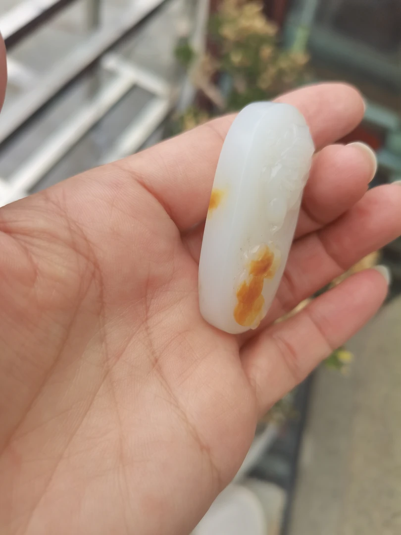 和田玉红皮白玉财神精雕